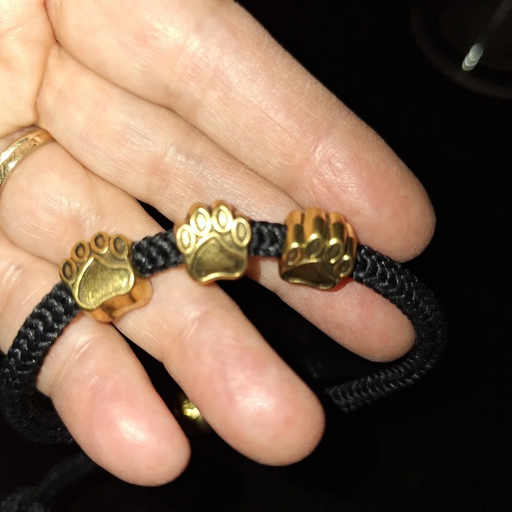 Gold Toned BEAR PAW Beaded BLACK Cord Pull Style BRACELET Unisex